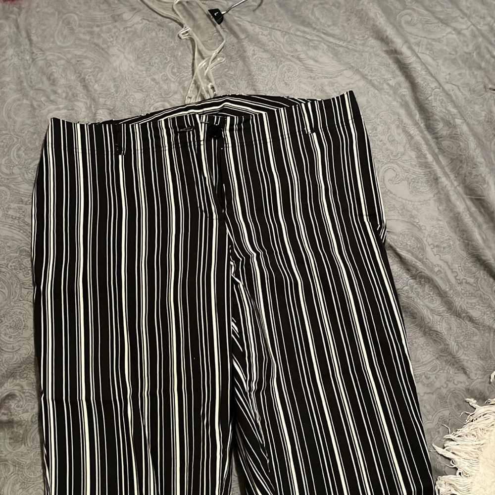 Black capris with white stripe
